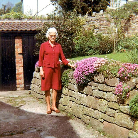 Amy in later years in her garden