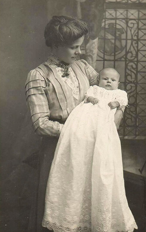 Christening portrait for Alan Geoffrey Lock in 1915.  His mother Irene Alice (Barton) Lock who was one of the daughters of Alfred Barton and Emma Quinton.