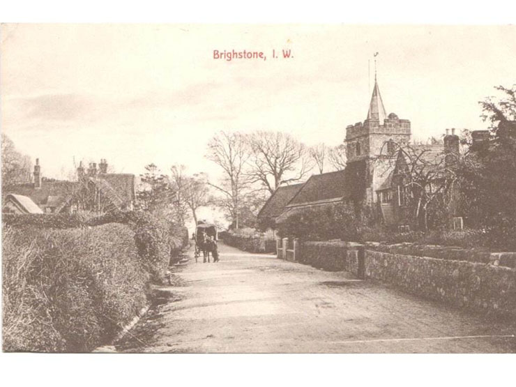 Brighstone - the road and church shown on a postcard of around 1920