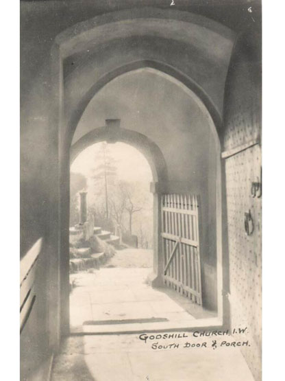 Godshill Church - the south door and porch  in a postcard of perhaps the 1930s 