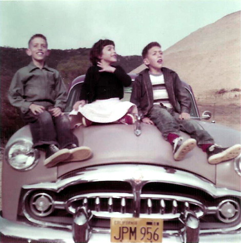 Dora’s children on a car in 1957